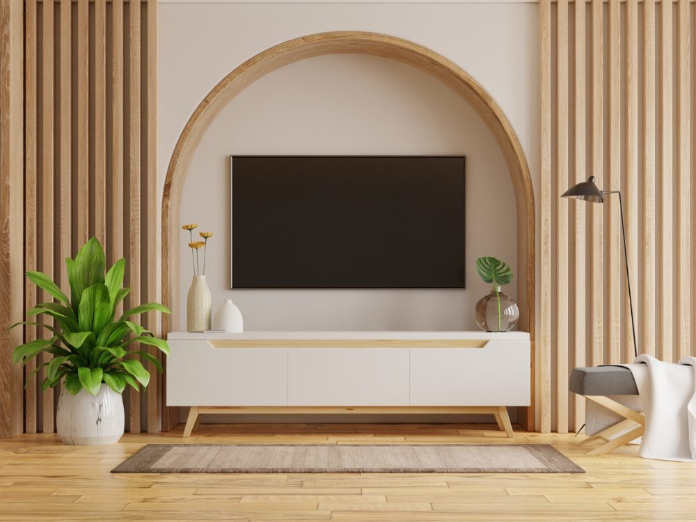 Arched TV unit with fluted wood panelling and floating console